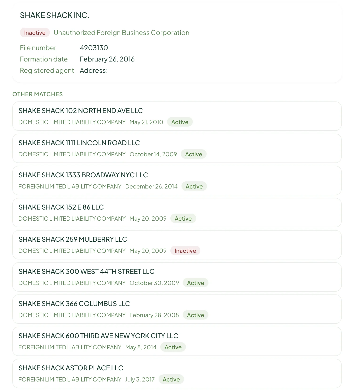 Matched registry records with status badges